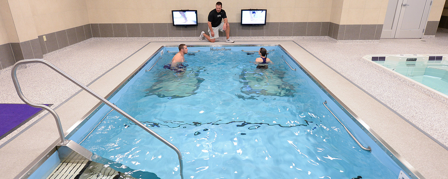 Two People training in therapy pool